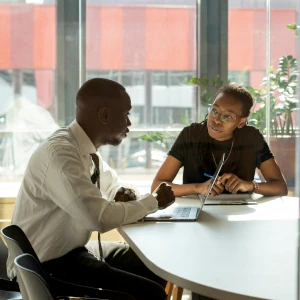 people talking at a table